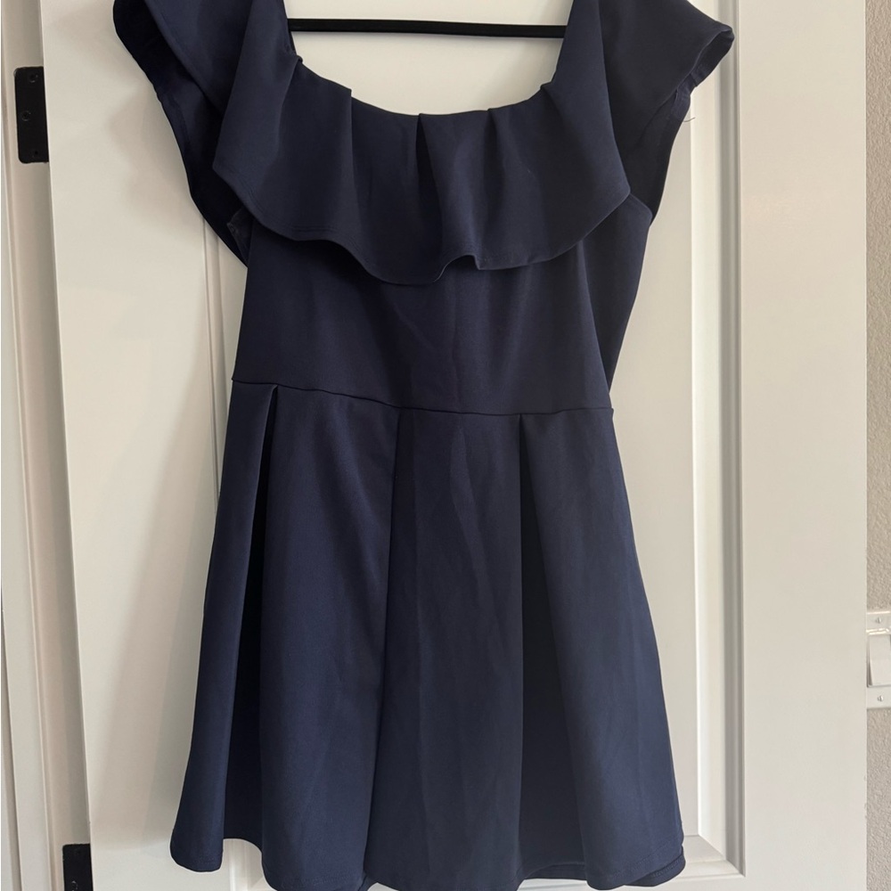 Off the shoulder navy ruffle romper